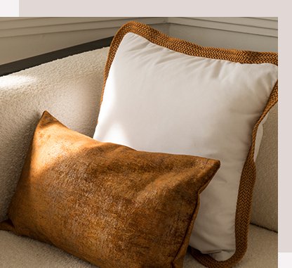 Biało-rudy zestaw poduszek dekoracyjnych Tesse